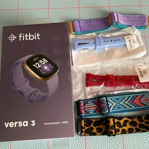 Fitbit Versa 3 like new smartwatch + 5 bands including brand new ones!
